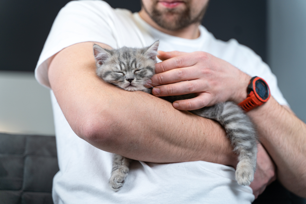 man with his cat