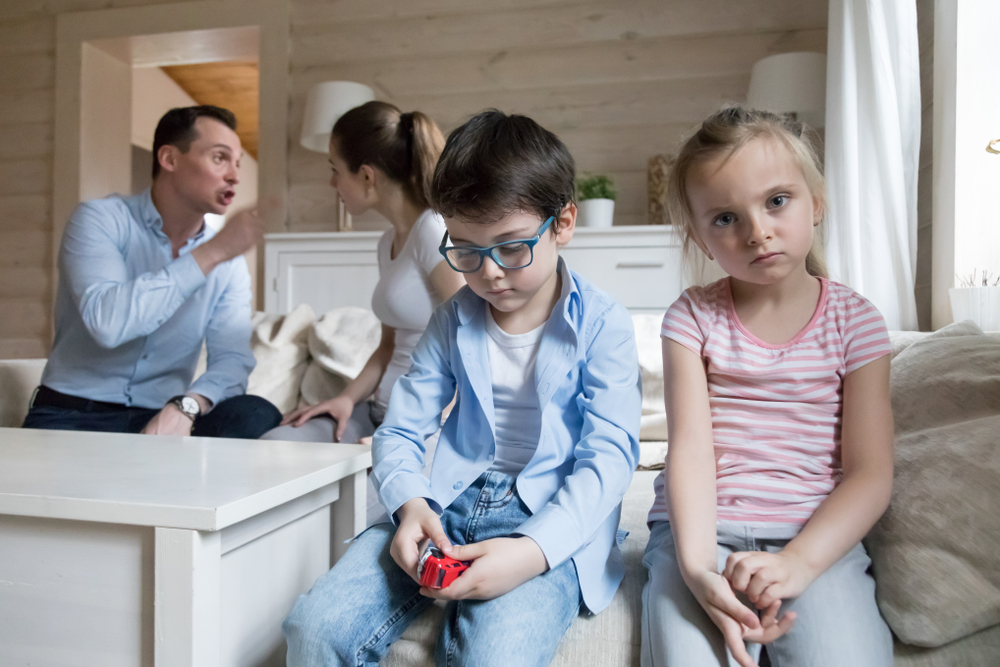 children are sad while their parents arguing