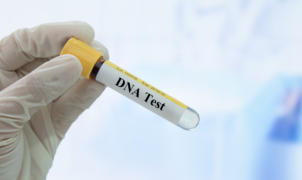 DNA test. Doctor holding sample blood collection tube for dna test in the laboratory. 
